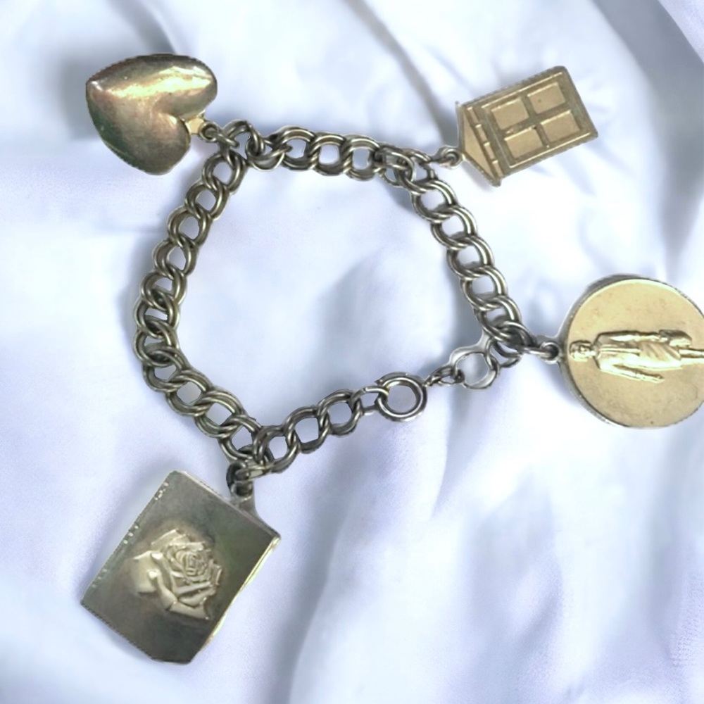 1965 Avon representative award charm bracelet